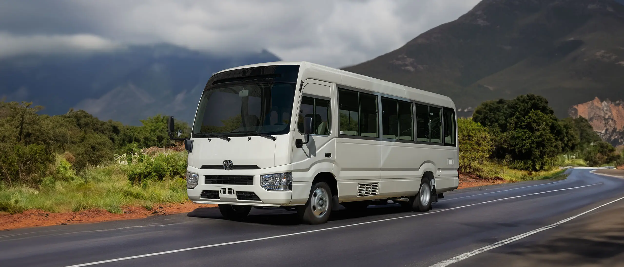20+ Seater Toyota Coaster Bus Rental Dubai - Large Group Transport Van